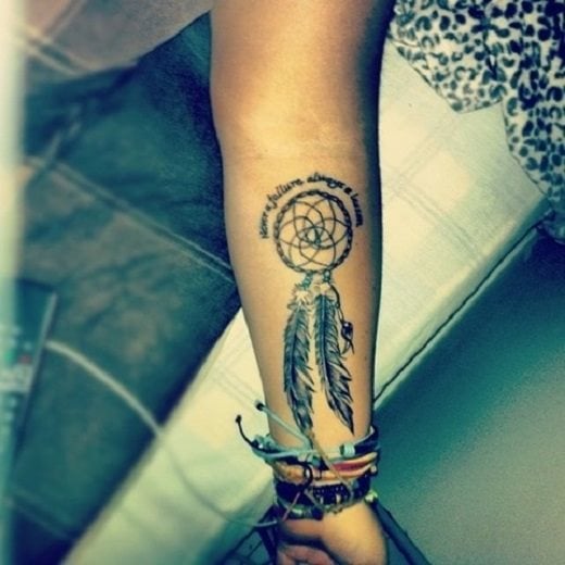 Que symbolise un attrape-rêve sur un tattoo?