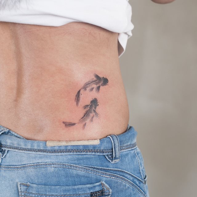 tattoo feminin de carpe 21