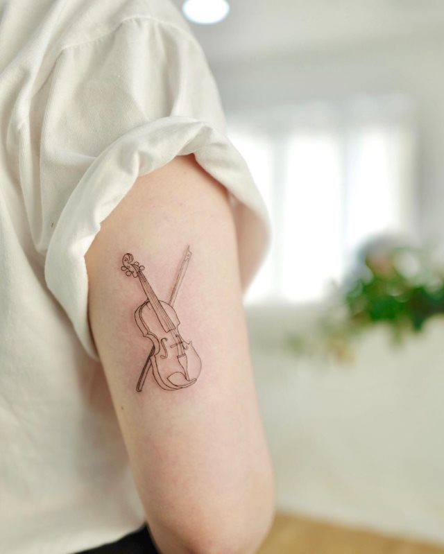 tattoo feminin musicale 33