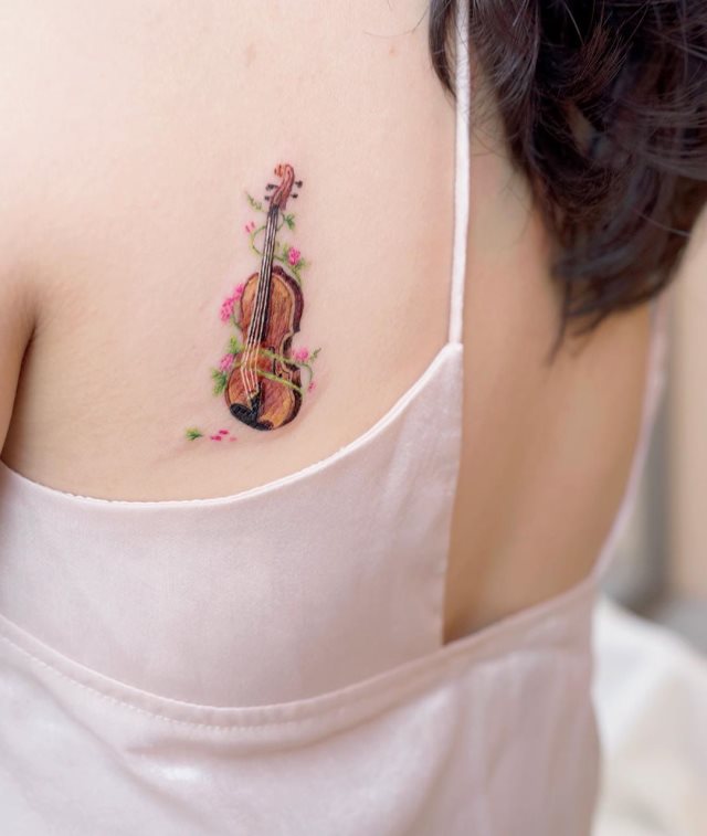 tattoo feminin musicale 34