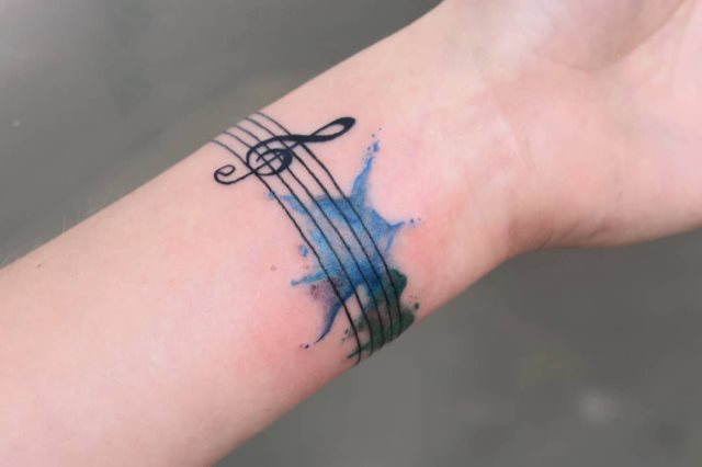 tattoo feminin musicale 67