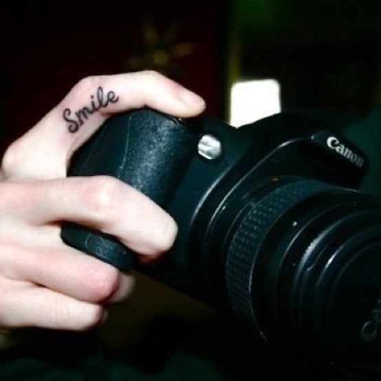 11 tatouage doigt photo