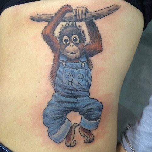 Que symbolise un singe sur un tatouage?