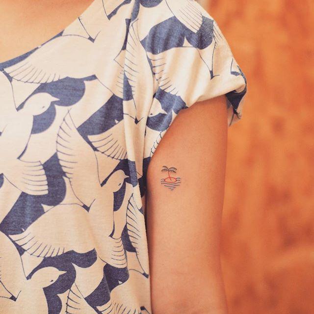 tatouage bras femme 203
