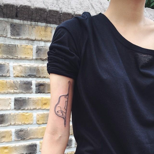 tatouage bras femme 31