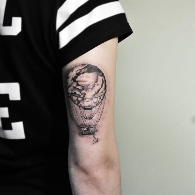 tatouage bras homme 151