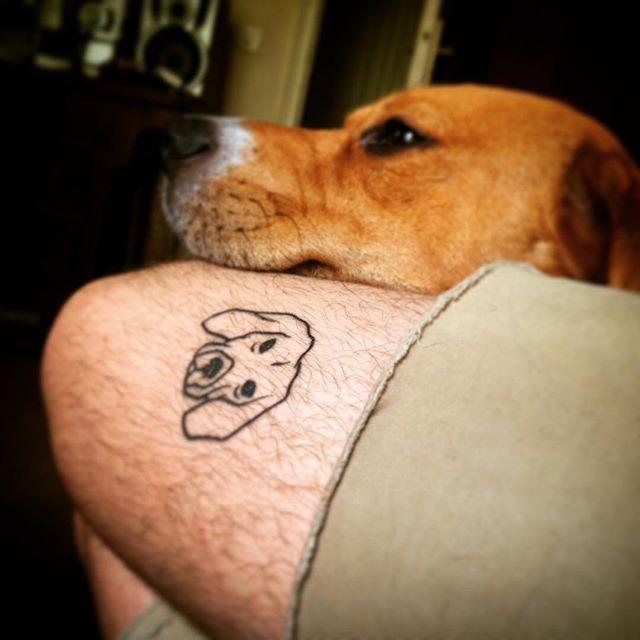 tatouage chien 91