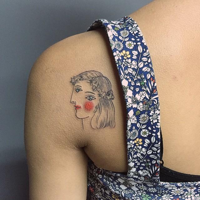 tatouage dos pour femme 169