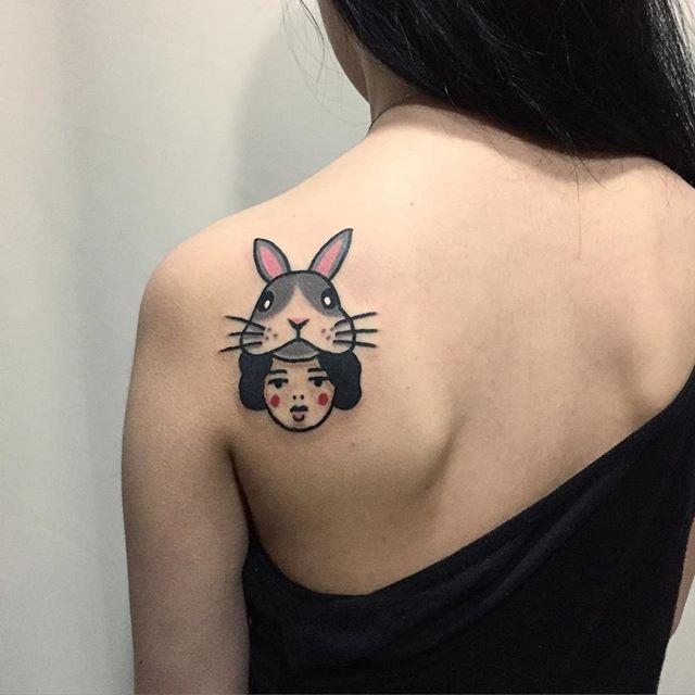 tatouage dos pour femme 183