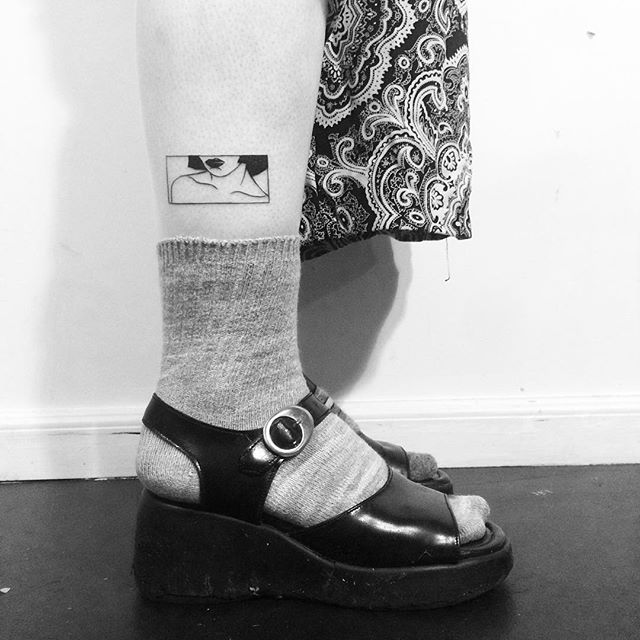 tatouage femme jambe 189