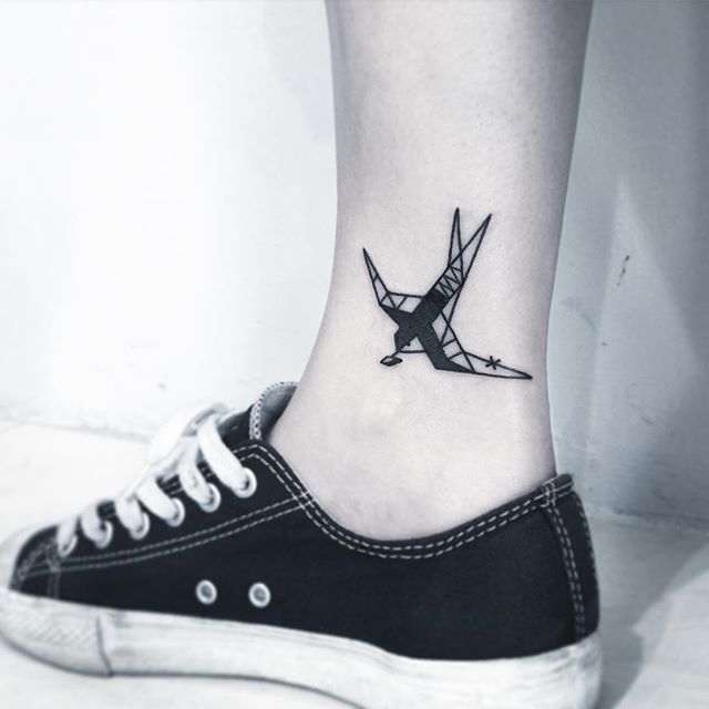 tatouage femme jambe 37
