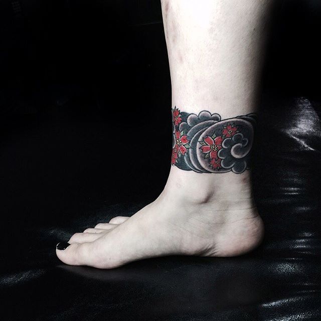 tatouage femme jambe 69