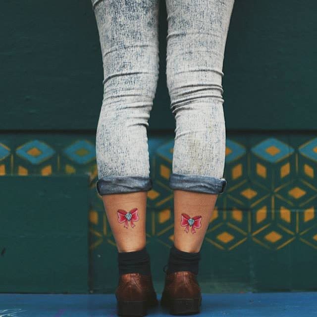 tatouage femme jambe 83