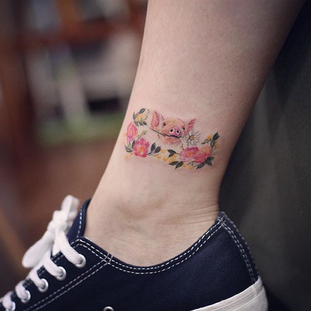 tatouage femme jambe 97