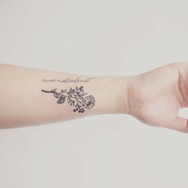 tatouage fleur 55