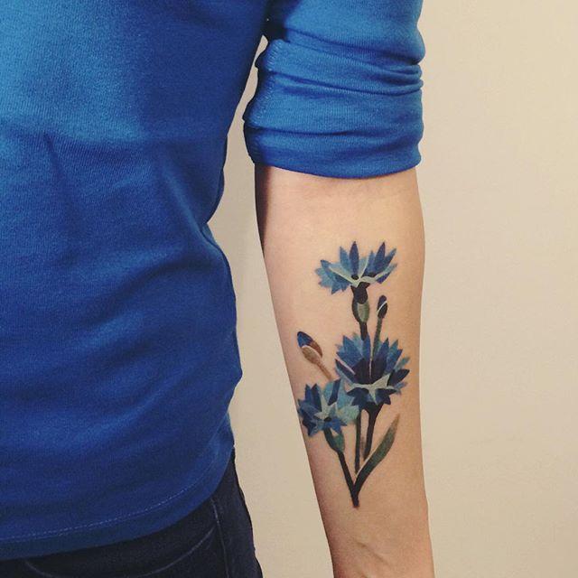 tatouage fleur 63