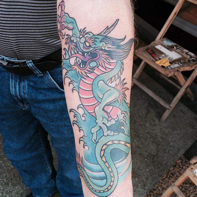 tatouage dragon 75