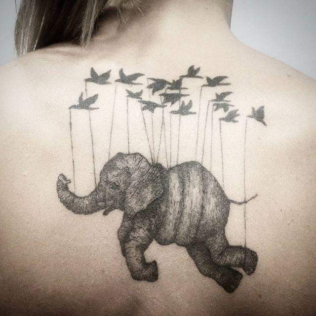tatouage elephant 89