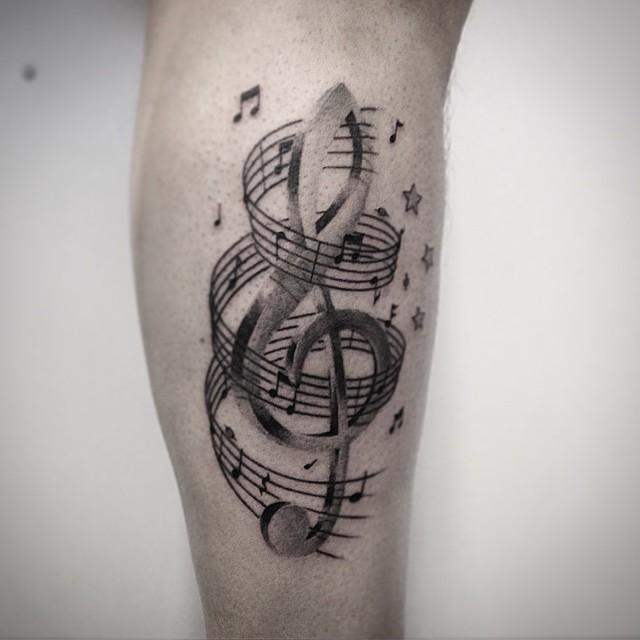 tatouage musicale 113