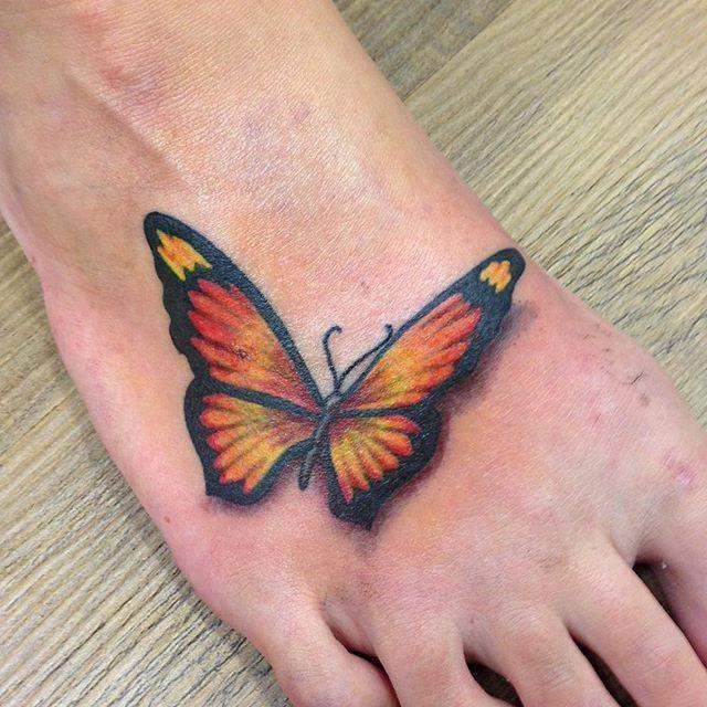 tatouage papillon 63