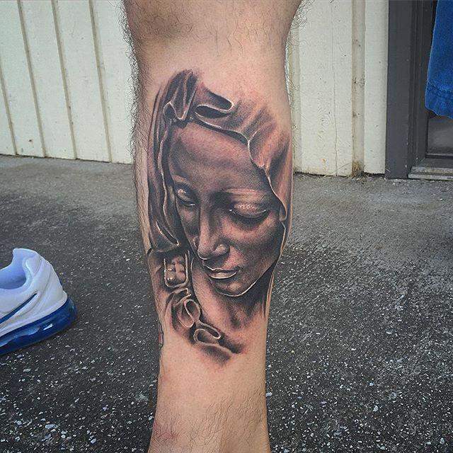 tatouage vierge marie 69