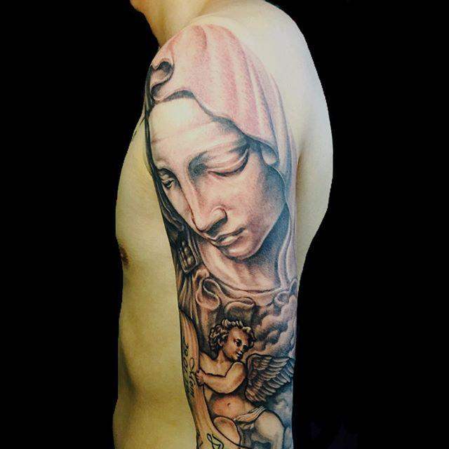 tatouage vierge marie 91