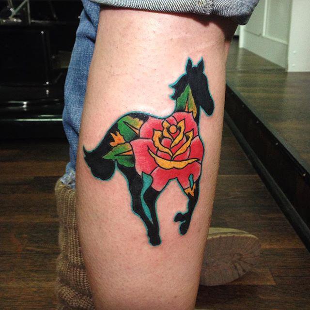 tatouage cheval 49