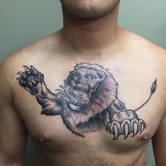 tatouage lion 79
