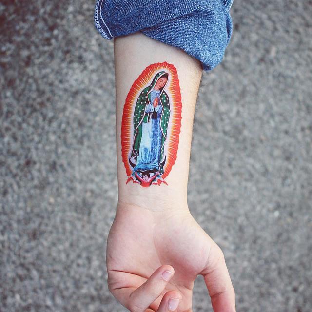 tatouage motif religieux 43