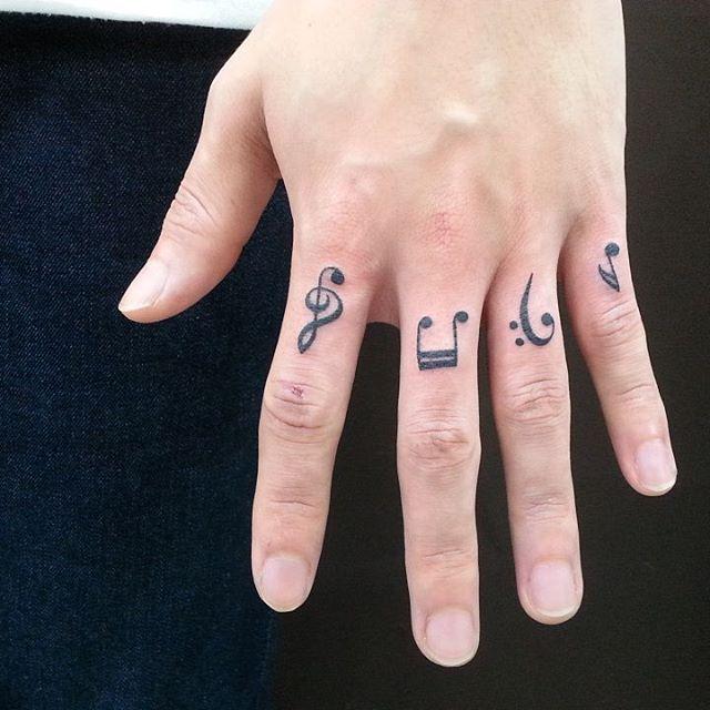 tatouage note musical 89