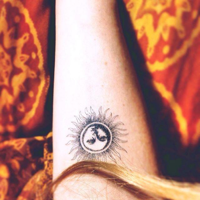 tatouage soleil 103