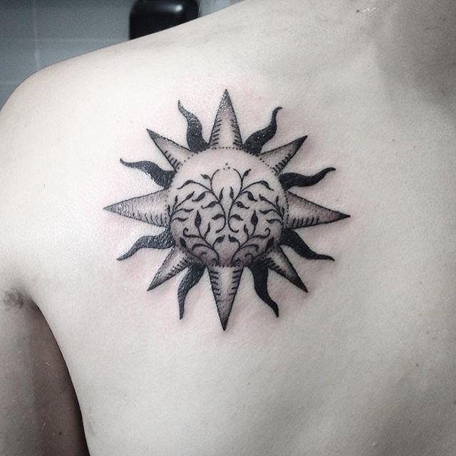tatouage soleil 87