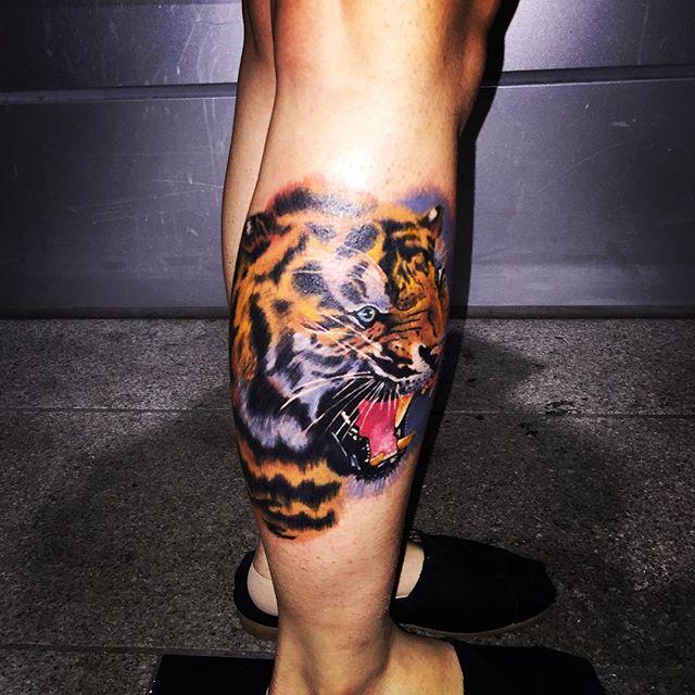 tatouage tigre 55