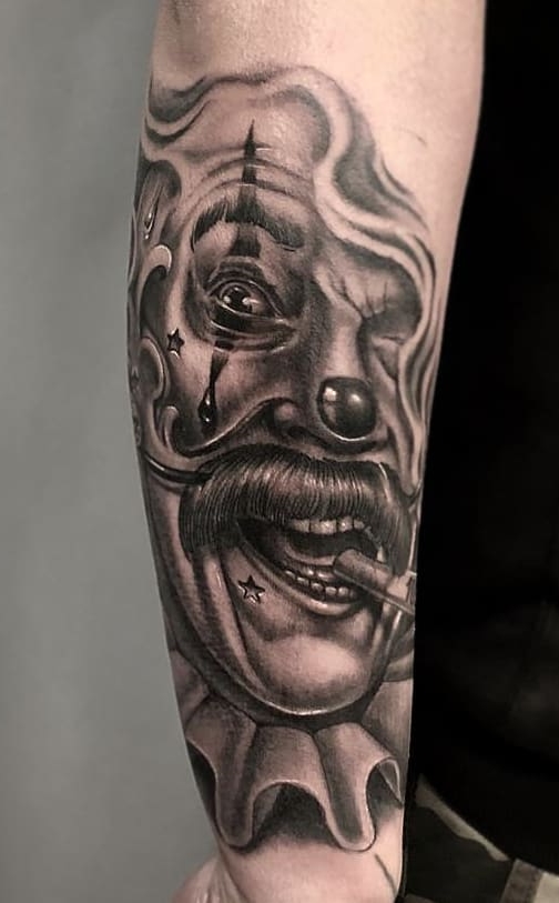 tatouage masculin de clown 71