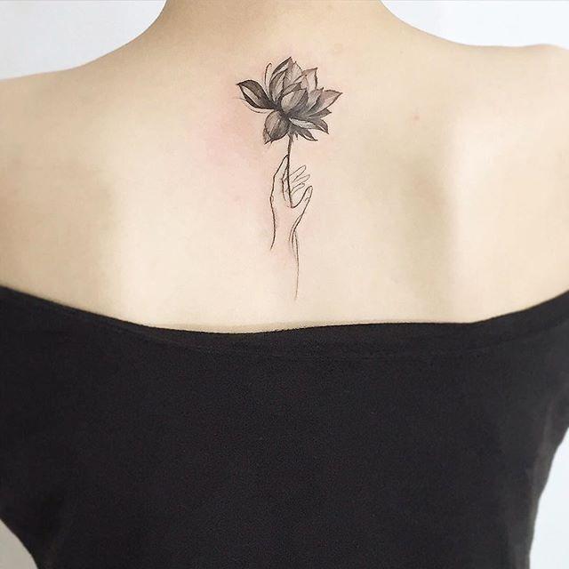 tatuaggio fiore di loto 77